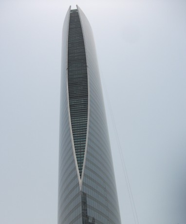 Skyscraper with Cord, Doha, Qatar, 2011, Inkjet Print on Hahnemule Fine Art Paper, 20 x 24 inches, edition of 10.  One of the many beautiful new skyscrapers in Doha, the capital of Qatar.  This building is sleek and sculptural.  It is unclear if the cord on the right side of the image is because the building is still under construction, or if window cleaning is planned, or for some other purpose. Doha is replete with incredibly beautiful skyscrapers, some very futuristic.  Qatar borders Saudi Arabia and the Persian Gulf and has the highest per-capita income of any nation in the world.  